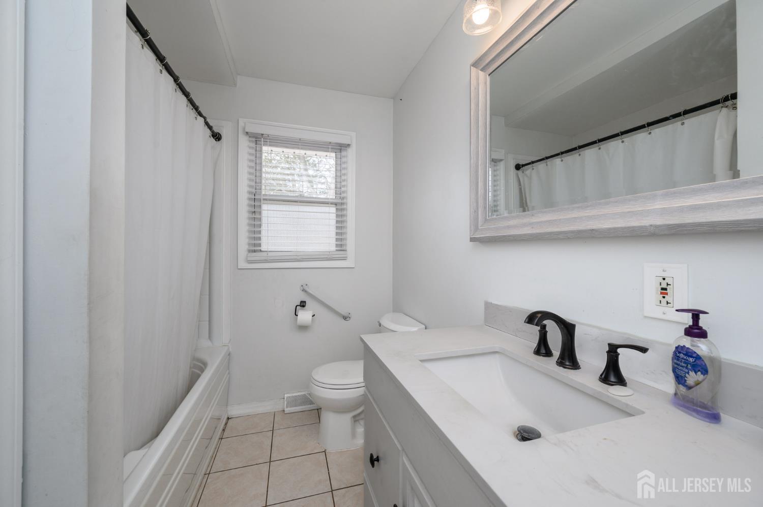 384 Cook Road Jackson, NJ 08527 - Photo 21 of 31 a bathroom with a sink and a toilet