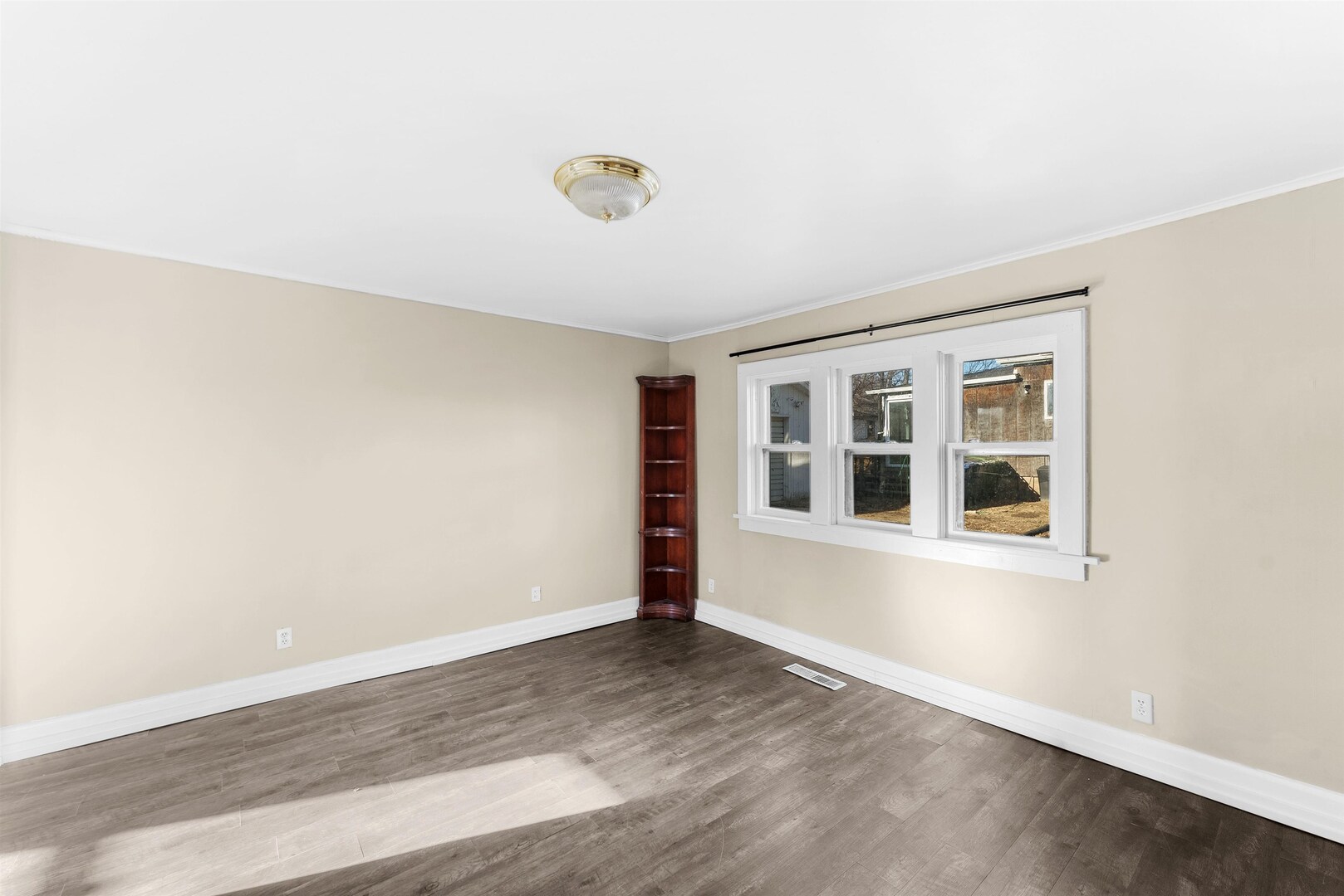 2202 Pershing Boulevard Clinton, IA 52732 - Photo 7 of 32 an empty room with a window