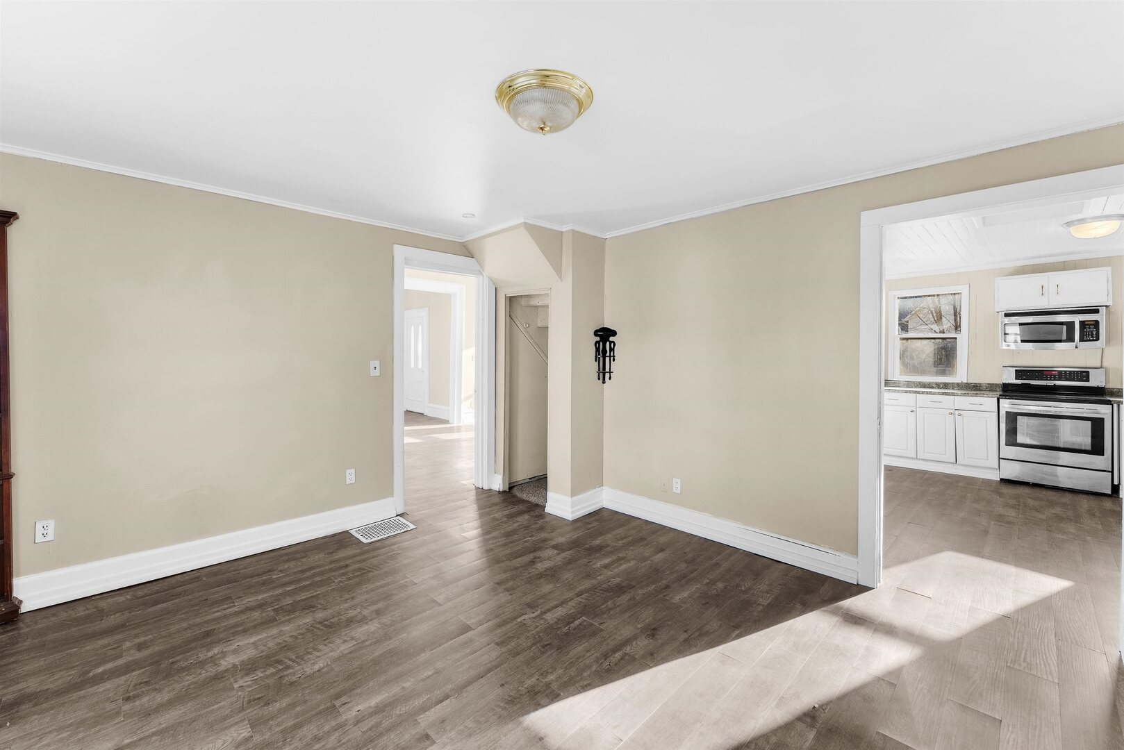 2202 Pershing Boulevard Clinton, IA 52732 - Photo 8 of 32 a view of an empty room with kitchen and window