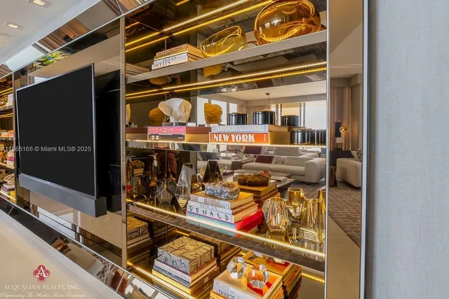 a kitchen with stainless steel appliances kitchen island granite countertop a sink and cabinets