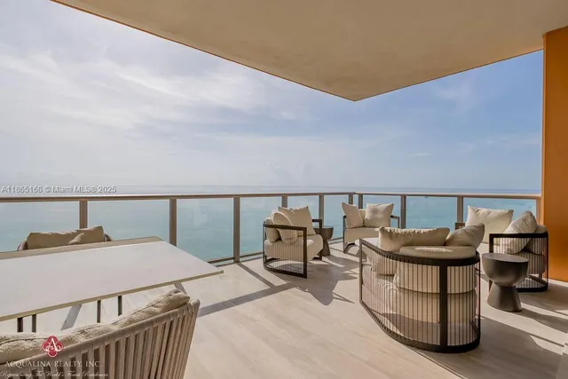 a kitchen with granite countertop a sink and stainless steel appliances