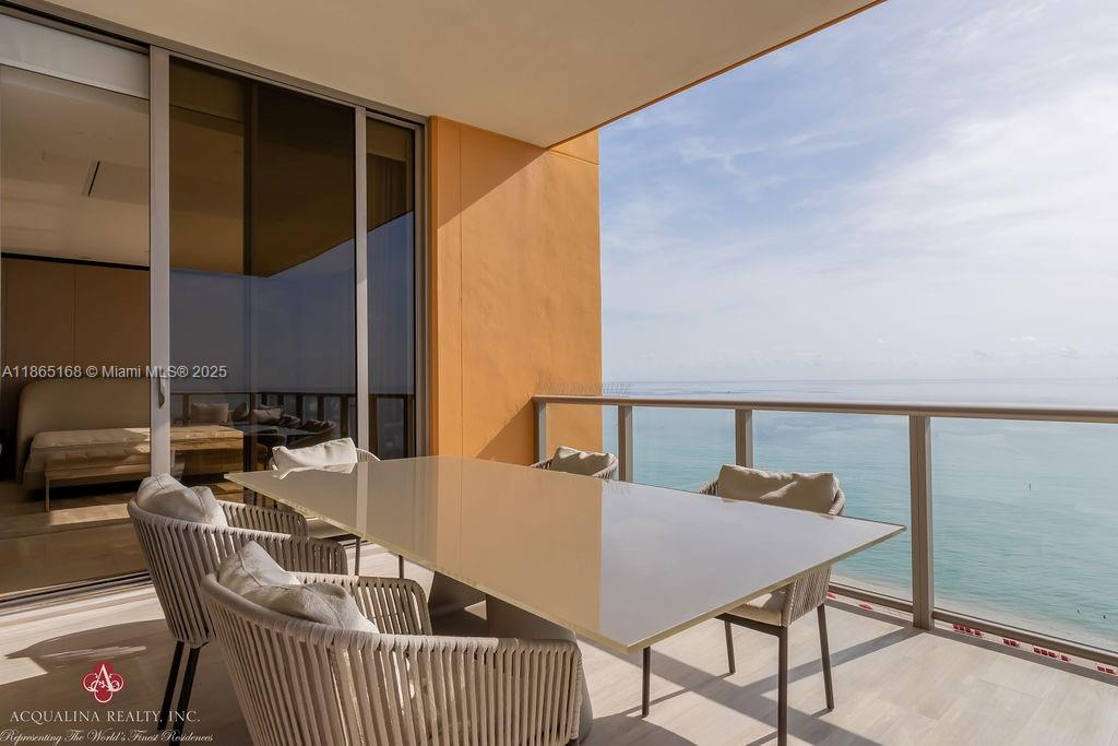 17749 Collins Avenue, Unit 902 Sunny Isles Beach, FL 33160 - Photo 22 of 82 a view of a balcony dining area