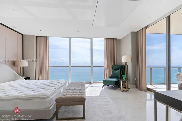 a bathroom with a tub and shower