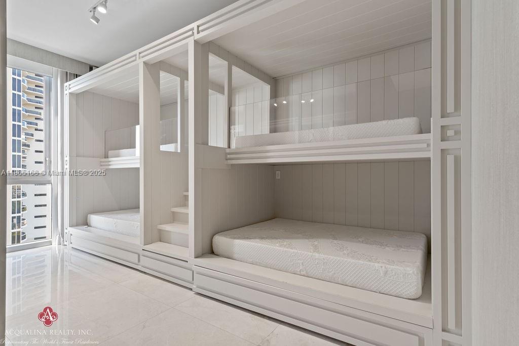 17749 Collins Avenue, Unit 902 Sunny Isles Beach, FL 33160 - Photo 59 of 82 a bathroom with a tub and shower