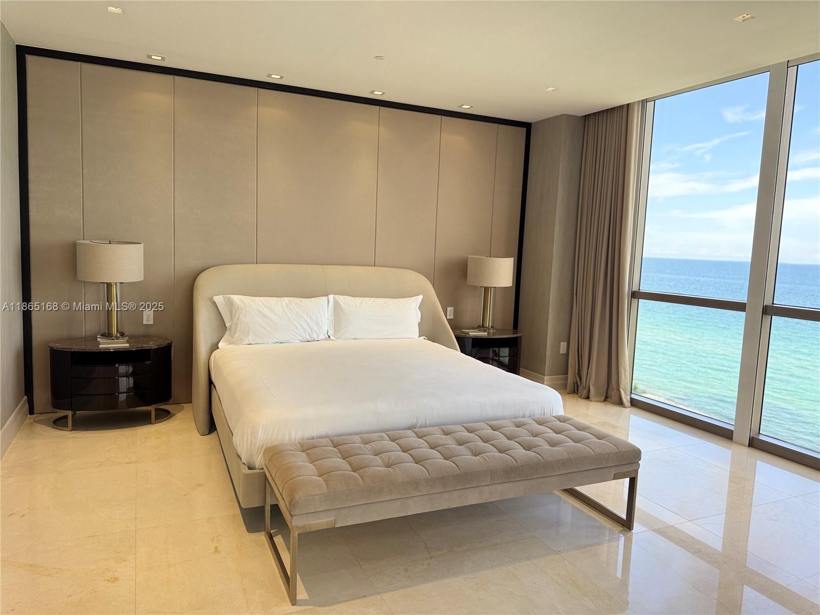 17749 Collins Avenue, Unit 902 Sunny Isles Beach, FL 33160 - Photo 80 of 82 a bedroom with a bed and a view of balcony