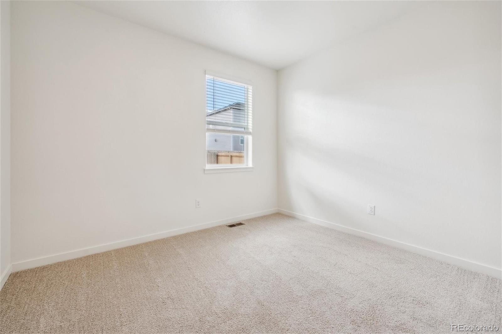 3482 Belleville Ridge Road Elizabeth, CO 80107 - Photo 11 of 21 an empty room with windows