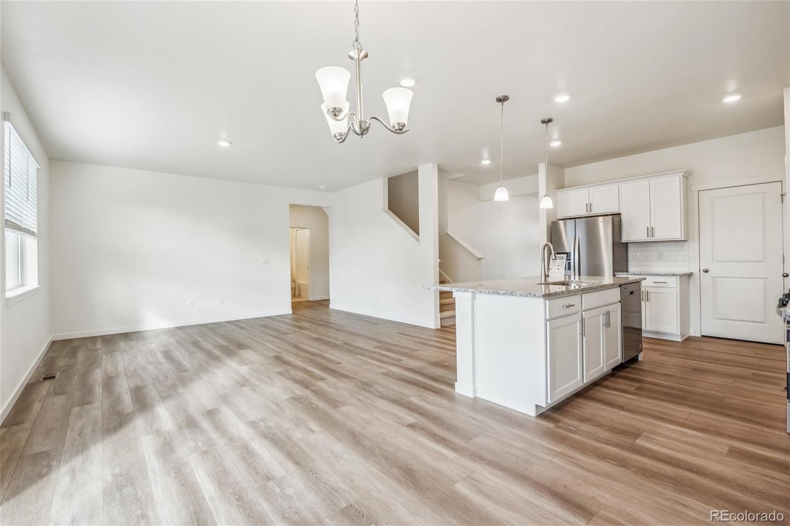 3482 Belleville Ridge Road Elizabeth, CO 80107 - Photo 6 of 21 a view of kitchen with sink microwave and stove
