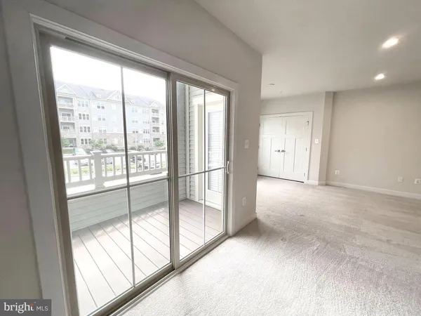 a view of a room with a wardrobe space