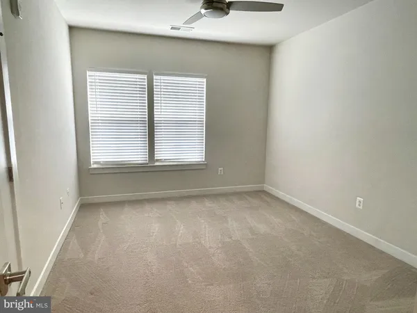 a bathroom with a sink a toilet and bathtub