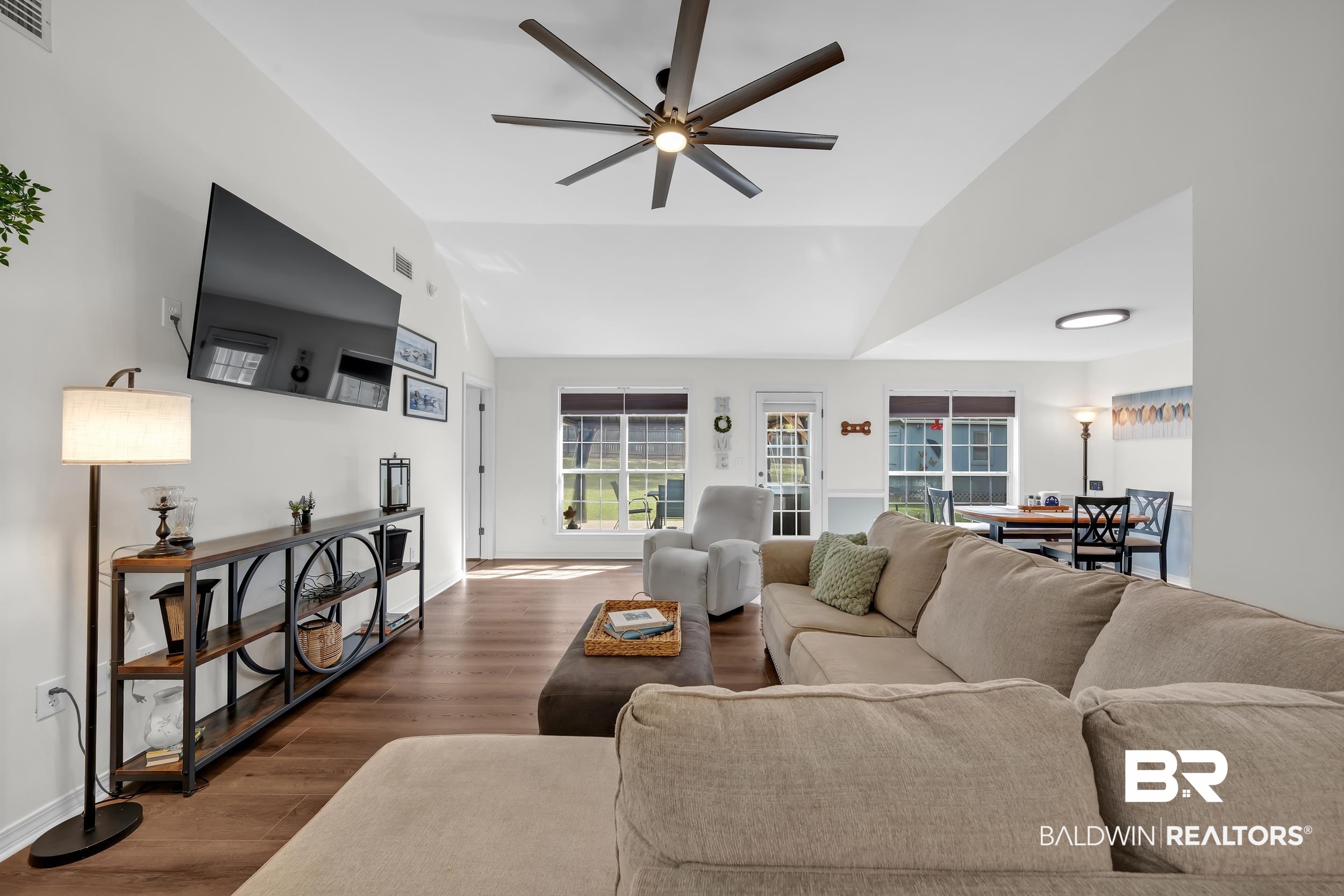 191 Robbins Boulevard Daphne, AL 36526 - Photo 4 of 24 Living room with wood finished floors, vaulted ceiling, and ceiling fan