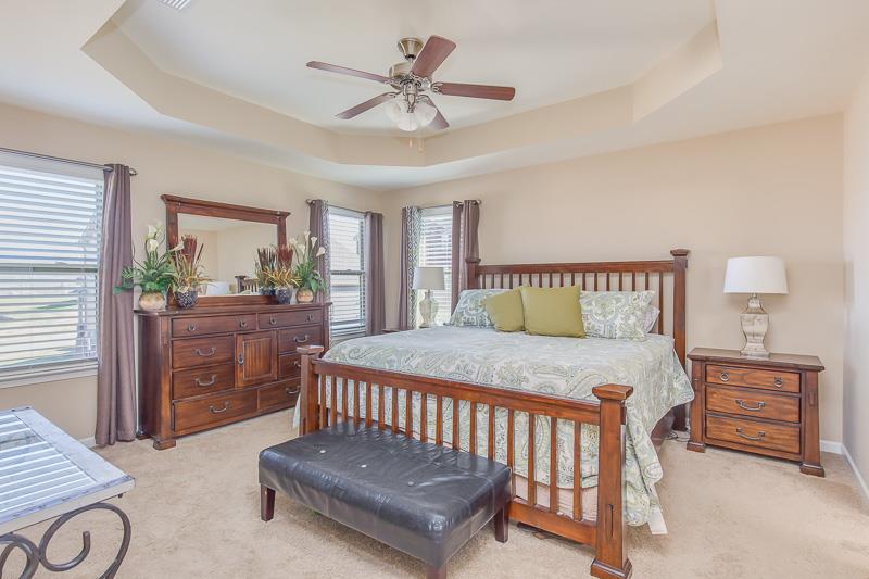 1007 Beverly Road Spring Hill, TN 37174 - Photo 13 of 24 a bedroom with a bed and a dresser