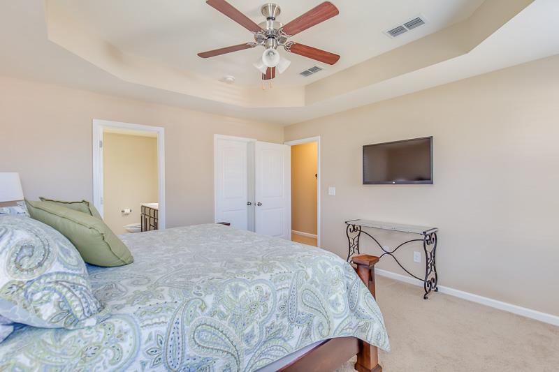 1007 Beverly Road Spring Hill, TN 37174 - Photo 14 of 24 a bedroom with a bed and a flat screen tv
