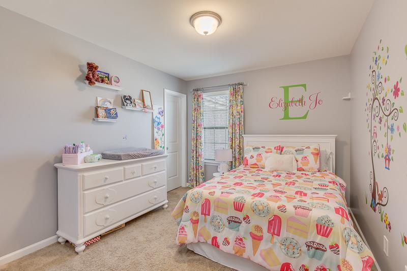 1007 Beverly Road Spring Hill, TN 37174 - Photo 16 of 24 a bedroom with a bed and a cabinets