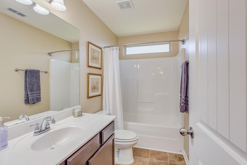1007 Beverly Road Spring Hill, TN 37174 - Photo 18 of 24 a bathroom with a sink a toilet and shower