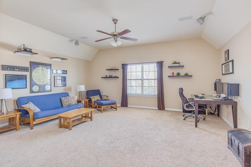 1007 Beverly Road Spring Hill, TN 37174 - Photo 21 of 24 a living room with furniture and a window