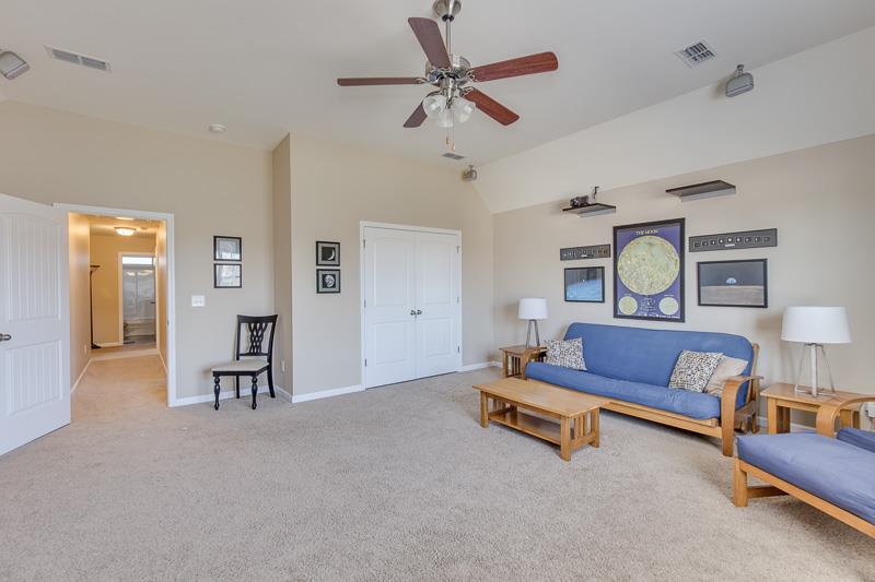 1007 Beverly Road Spring Hill, TN 37174 - Photo 22 of 24 a living room with furniture and a lamp