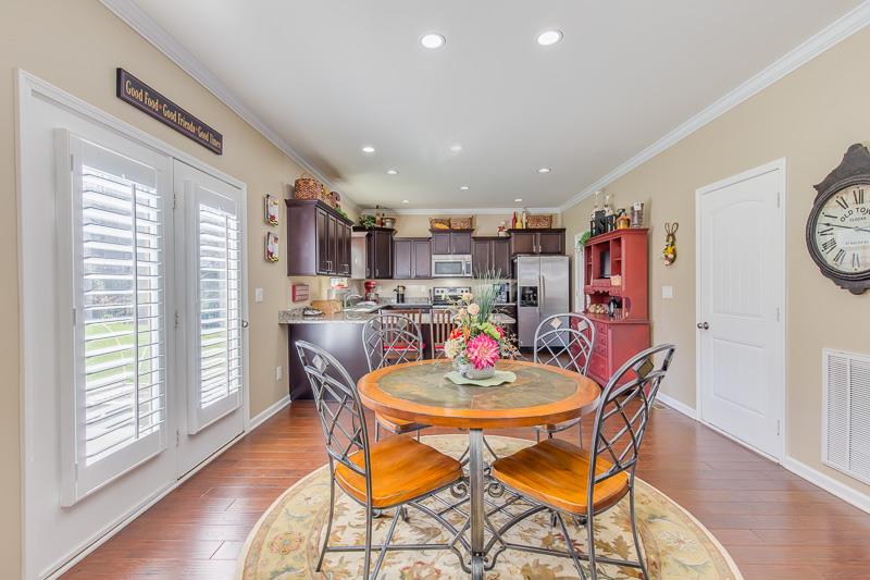 1007 Beverly Road Spring Hill, TN 37174 - Photo 8 of 24 a view of a dining room with furniture window and wooden floor