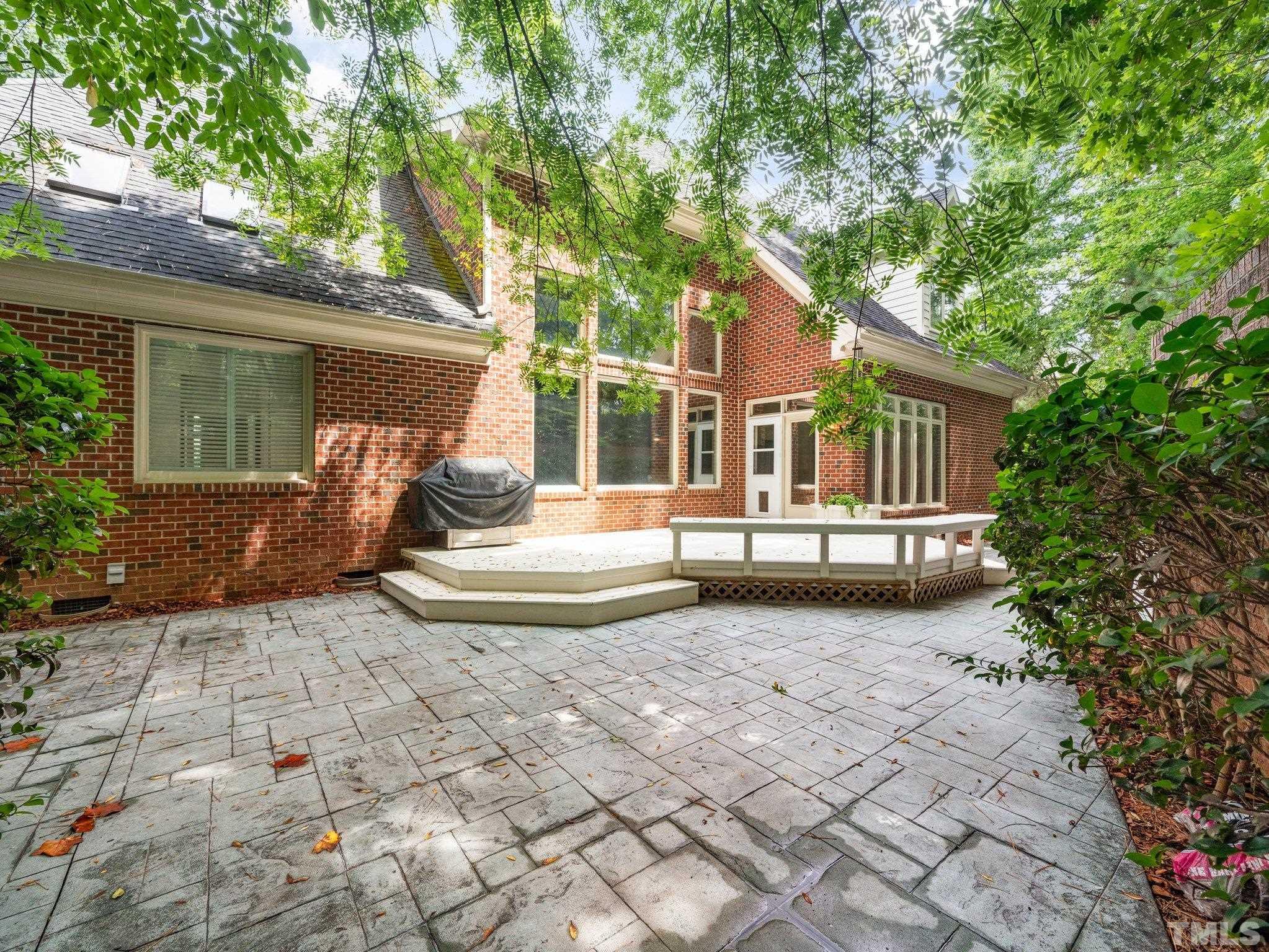 4009 George V Strong Wynd Raleigh, NC 27612 - Photo 35 of 41 a view of a house with backyard and sitting area