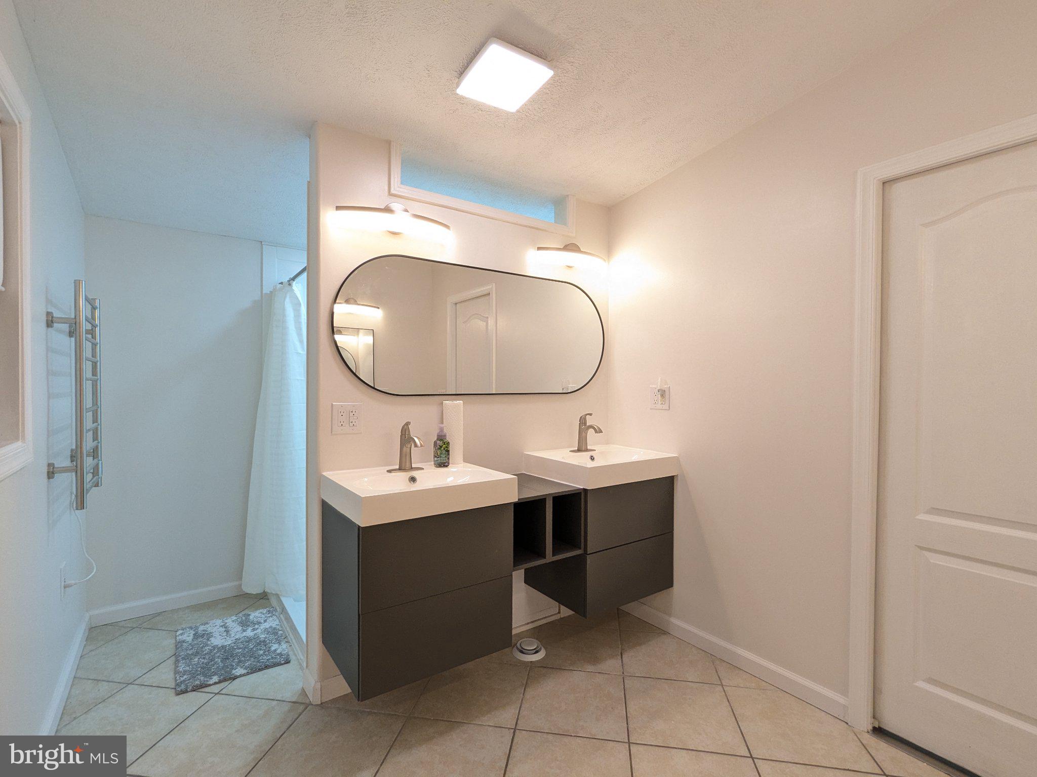 43705 Redmond Road Leonardtown, MD 20650 - Photo 3 of 15 Primary Bath with Heated Towel Rack