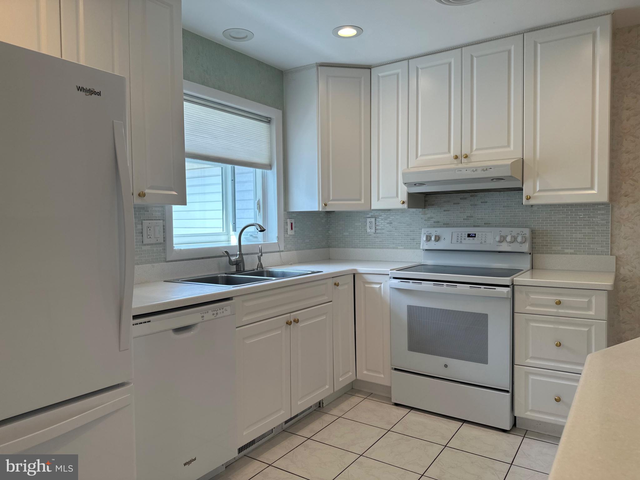 14616 Sturtevant Road Silver Spring, MD 20905 - Photo 11 of 44 Bright and airy modern kitchen space.