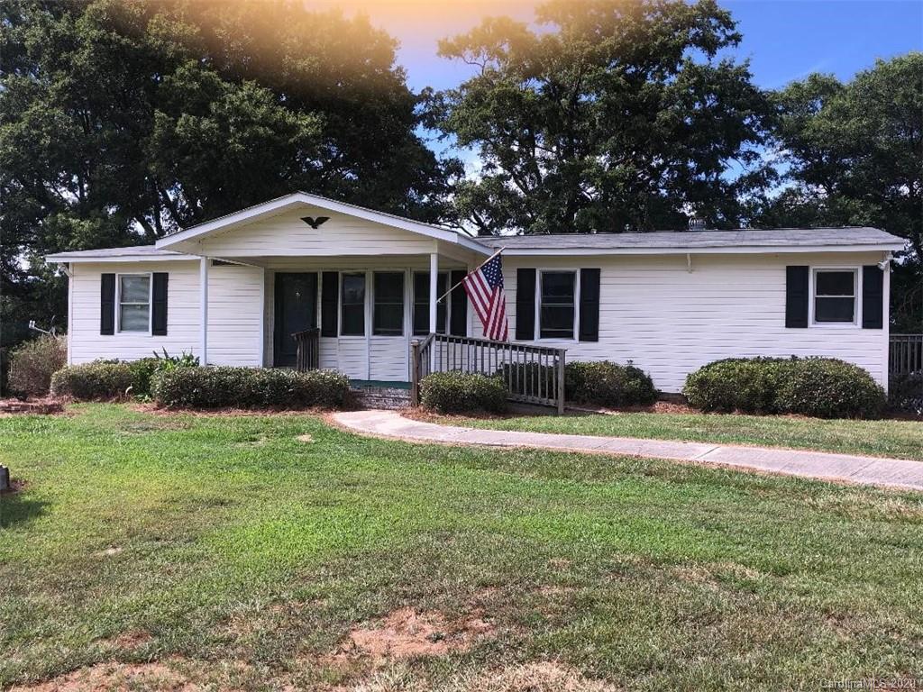 901 Clontz Long Road Monroe, NC 28110 - Photo 2 of 35 a front view of a house with a yard and porch