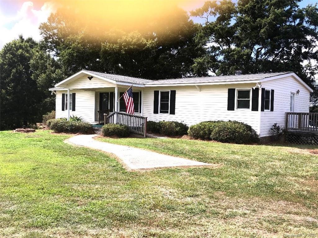901 Clontz Long Road Monroe, NC 28110 - Photo 3 of 35 a front view of a house with yard and green space