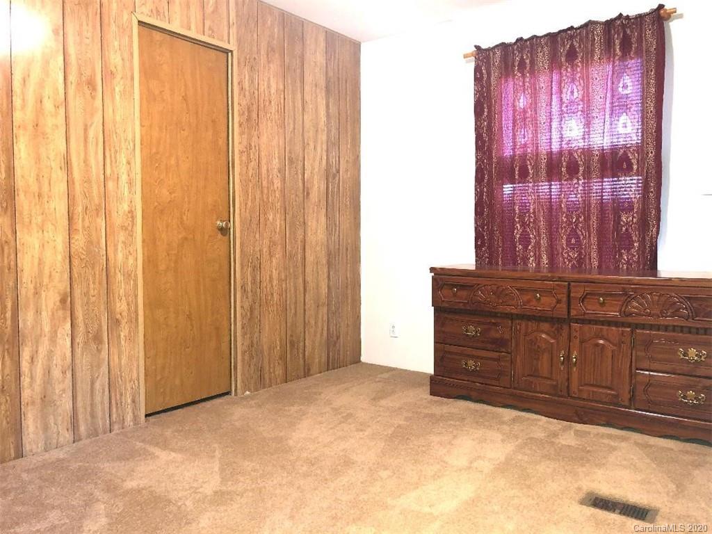 901 Clontz Long Road Monroe, NC 28110 - Photo 25 of 35 a view of a closet with wooden floor