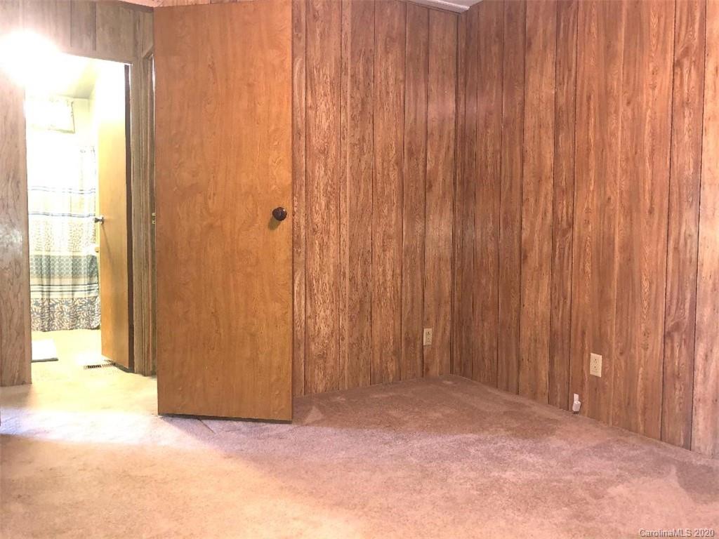 901 Clontz Long Road Monroe, NC 28110 - Photo 26 of 35 a view of an empty room with a window