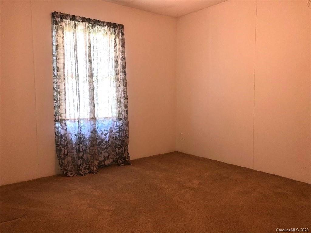 901 Clontz Long Road Monroe, NC 28110 - Photo 28 of 35 an empty room with a window