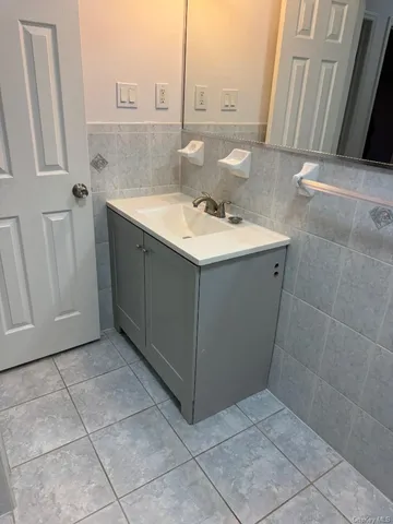 a view of a room with wooden floor and stairs
