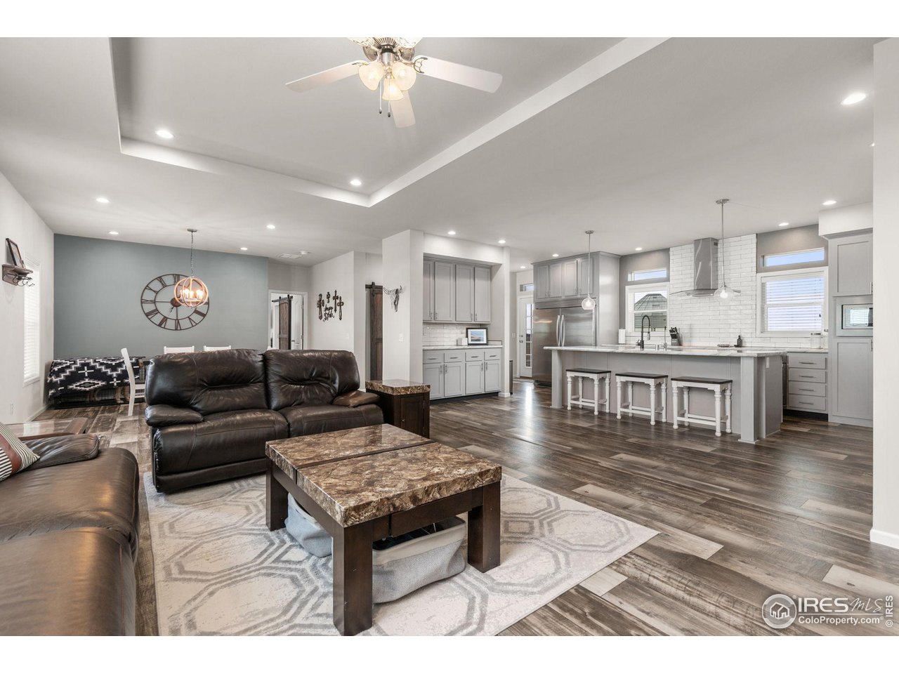 16244 County Road 94 Pierce, CO 80650 - Photo 11 of 37 a living room with furniture and kitchen view