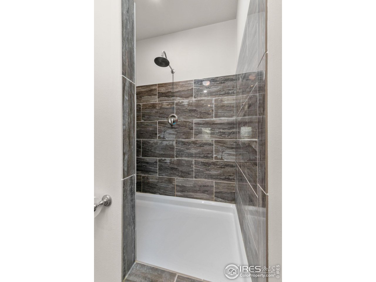 16244 County Road 94 Pierce, CO 80650 - Photo 17 of 37 a bathroom with a shower