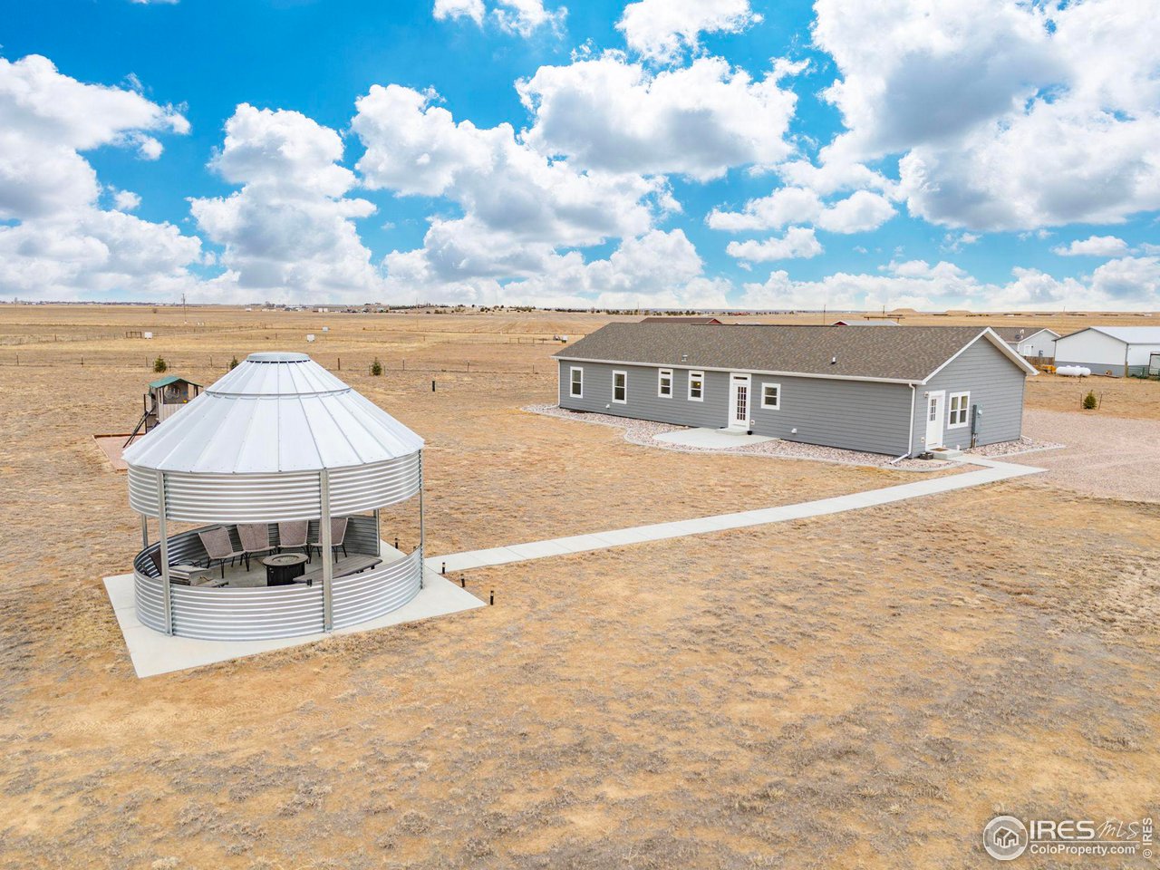16244 County Road 94 Pierce, CO 80650 - Photo 24 of 37 a view of a terrace with sky view