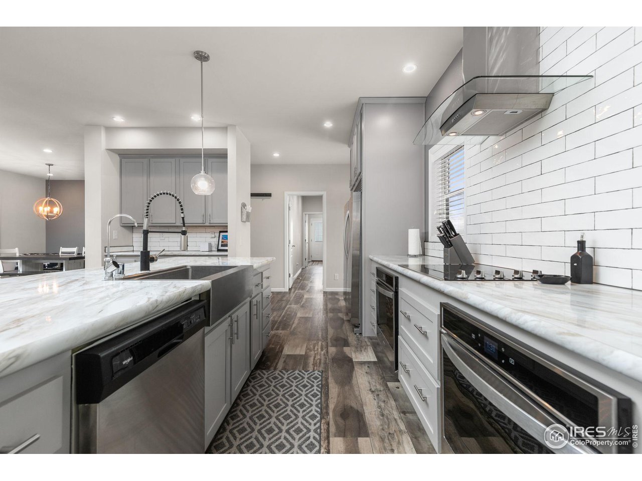 16244 County Road 94 Pierce, CO 80650 - Photo 7 of 37 a kitchen with a sink and stove