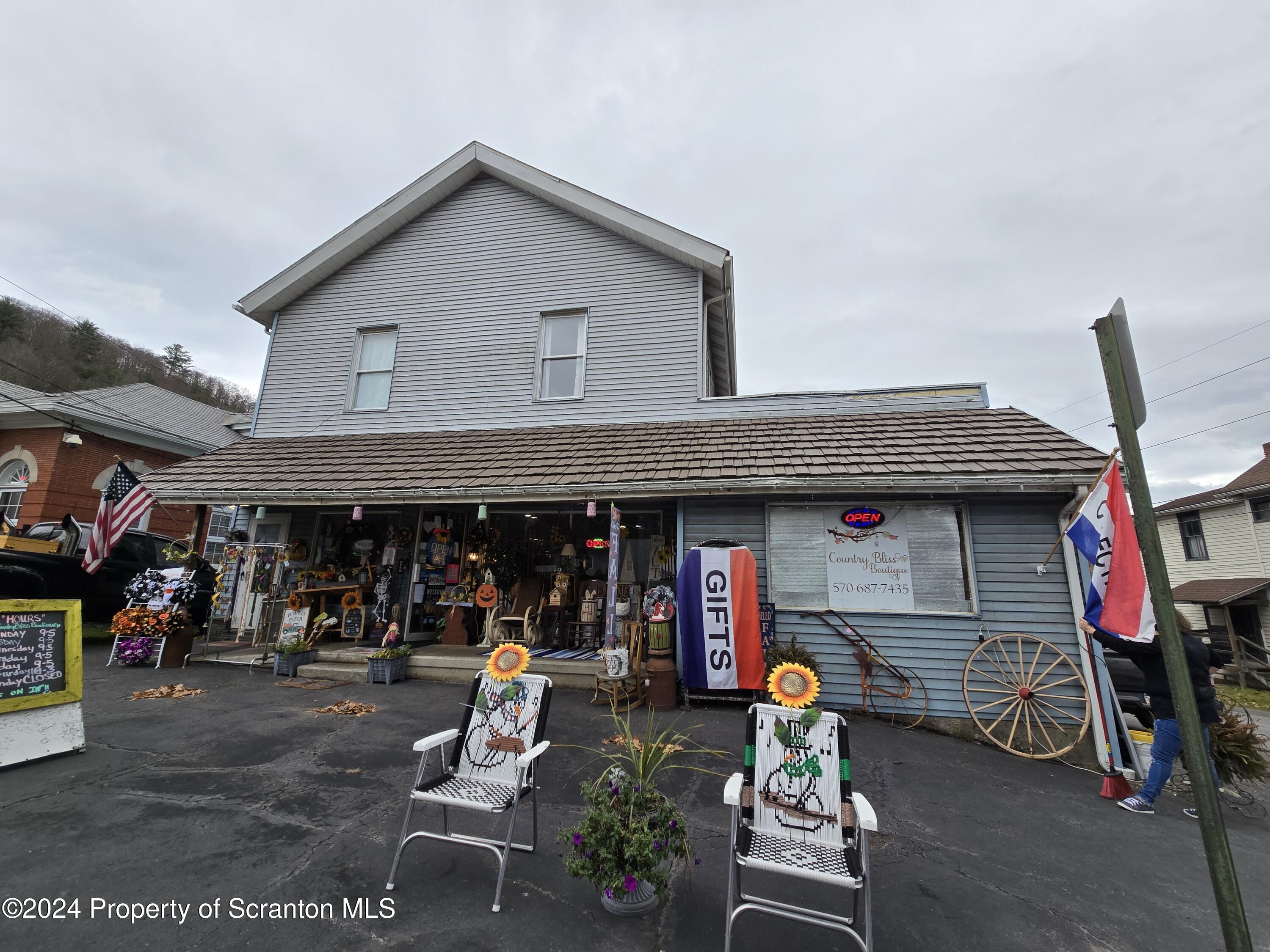a view of a chairs and tables in patio