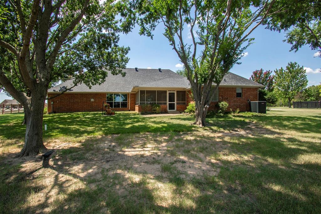 100 Durning Road Van Alstyne, TX 75495 - Photo 24 of 28 Private backyard with mature trees