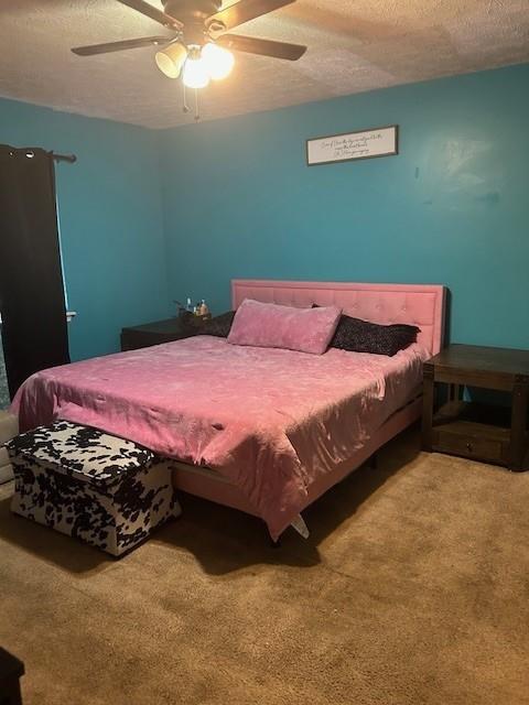 291 Highland Estates Commerce, GA 30529 - Photo 11 of 15 a bedroom with a bed and a chandelier