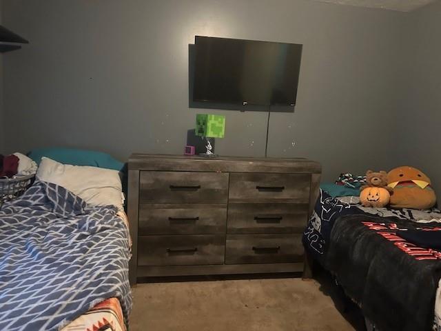 291 Highland Estates Commerce, GA 30529 - Photo 12 of 15 a living room with a bed furniture and a flat screen tv