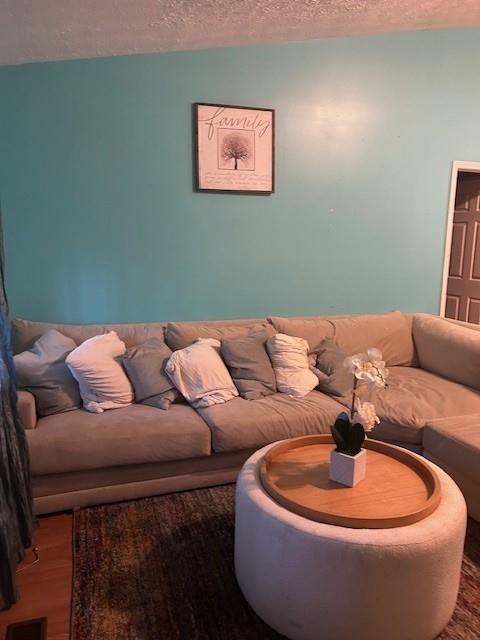 291 Highland Estates Commerce, GA 30529 - Photo 5 of 15 a blue couch sitting next to a blue chair