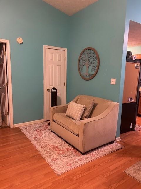 291 Highland Estates Commerce, GA 30529 - Photo 6 of 15 a living room with a bed furniture and a window