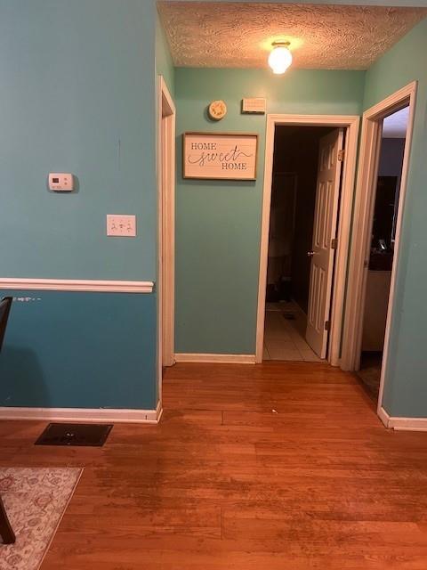 291 Highland Estates Commerce, GA 30529 - Photo 8 of 15 a view of an empty room with wooden floor