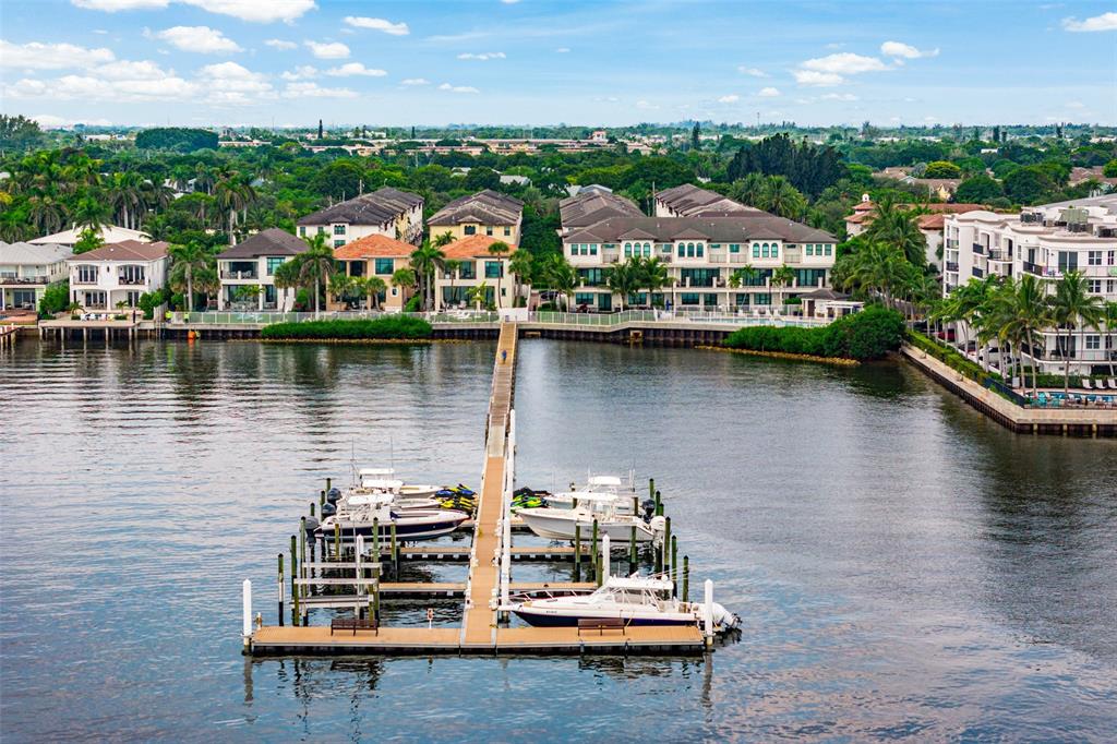 608 Windward Circle Boynton Beach, FL 33435 - Photo 1 of 26 a view of a lake with a city