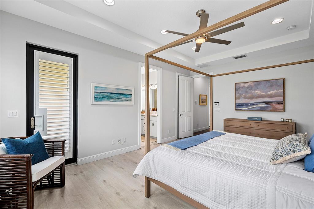 608 Windward Circle Boynton Beach, FL 33435 - Photo 11 of 26 a bedroom with a large bed and a window