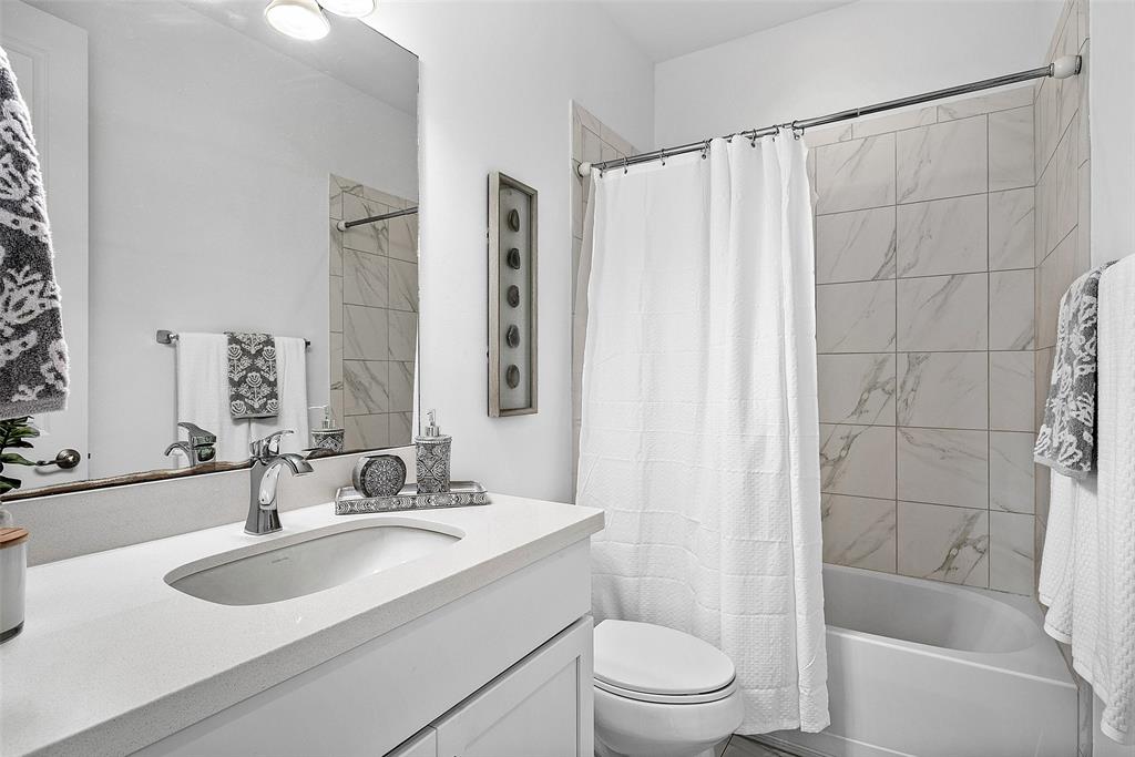 608 Windward Circle Boynton Beach, FL 33435 - Photo 15 of 26 a bathroom with a sink toilet and shower