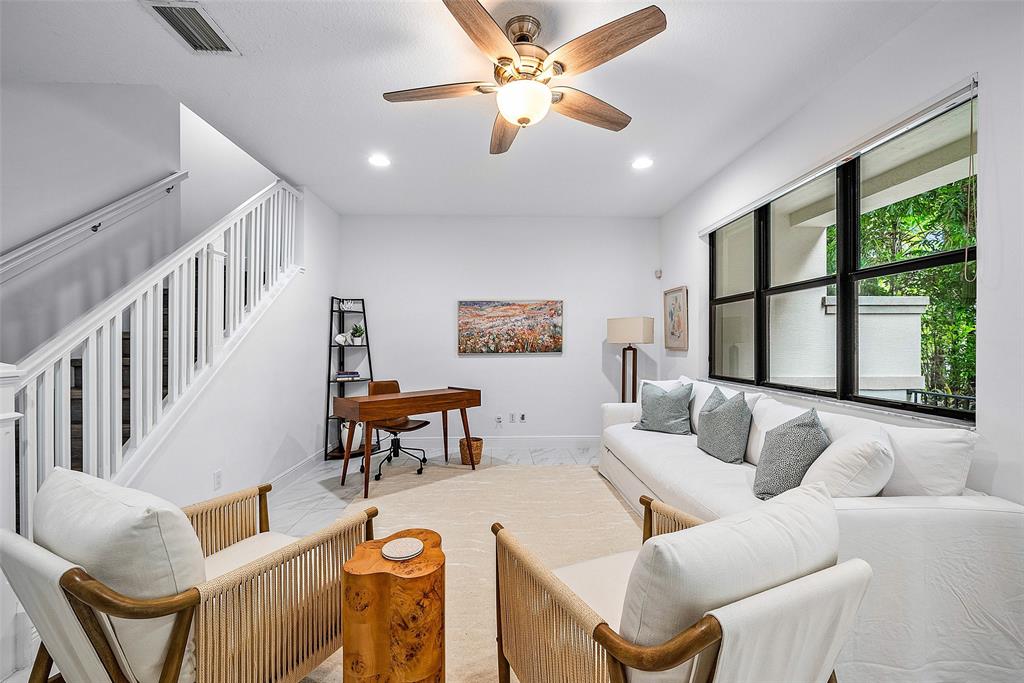 608 Windward Circle Boynton Beach, FL 33435 - Photo 21 of 26 a living room with furniture and a large window