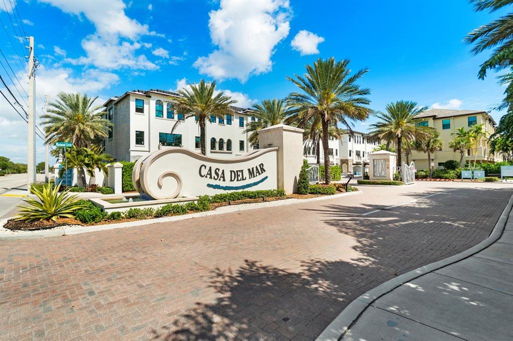 608 Windward Circle Boynton Beach, FL 33435 - Photo 26 of 26 a street sign with a view of palm trees