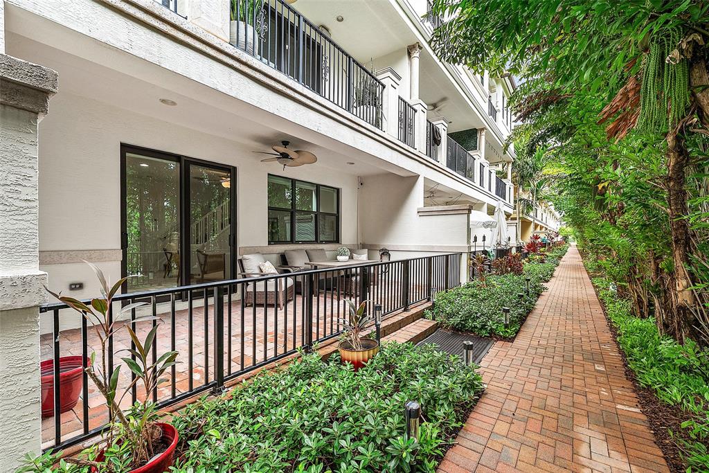 608 Windward Circle Boynton Beach, FL 33435 - Photo 4 of 26 a view of a house with large windows