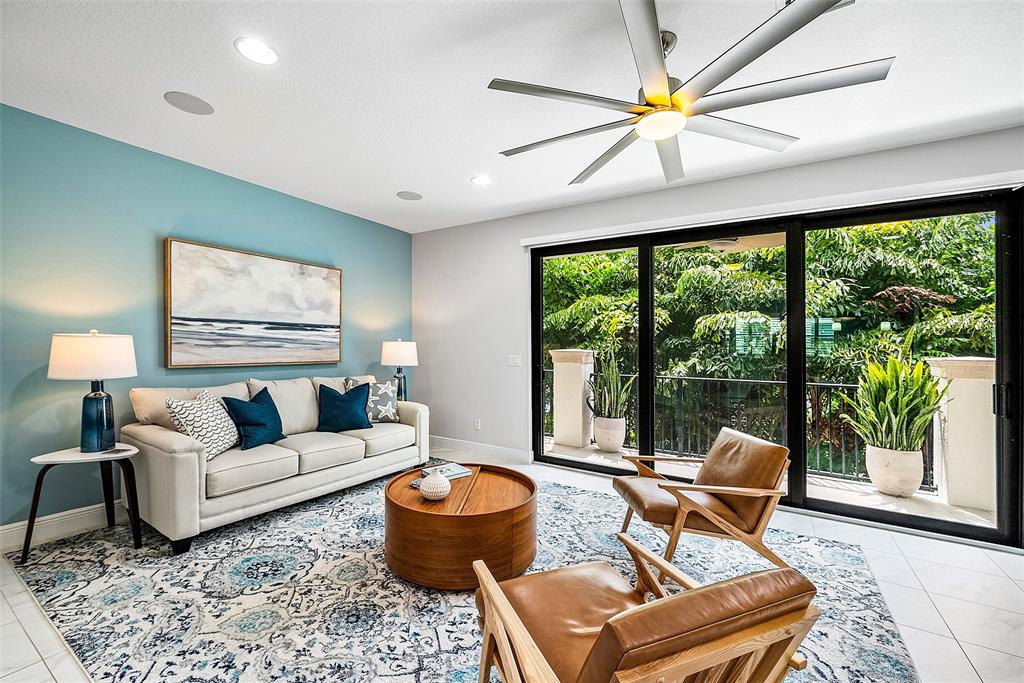 608 Windward Circle Boynton Beach, FL 33435 - Photo 5 of 26 a living room with furniture and a large window