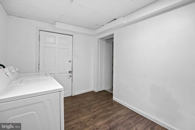 a view of a storage & utility room with wooden floor