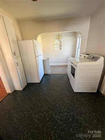 a view of walk in closet with window